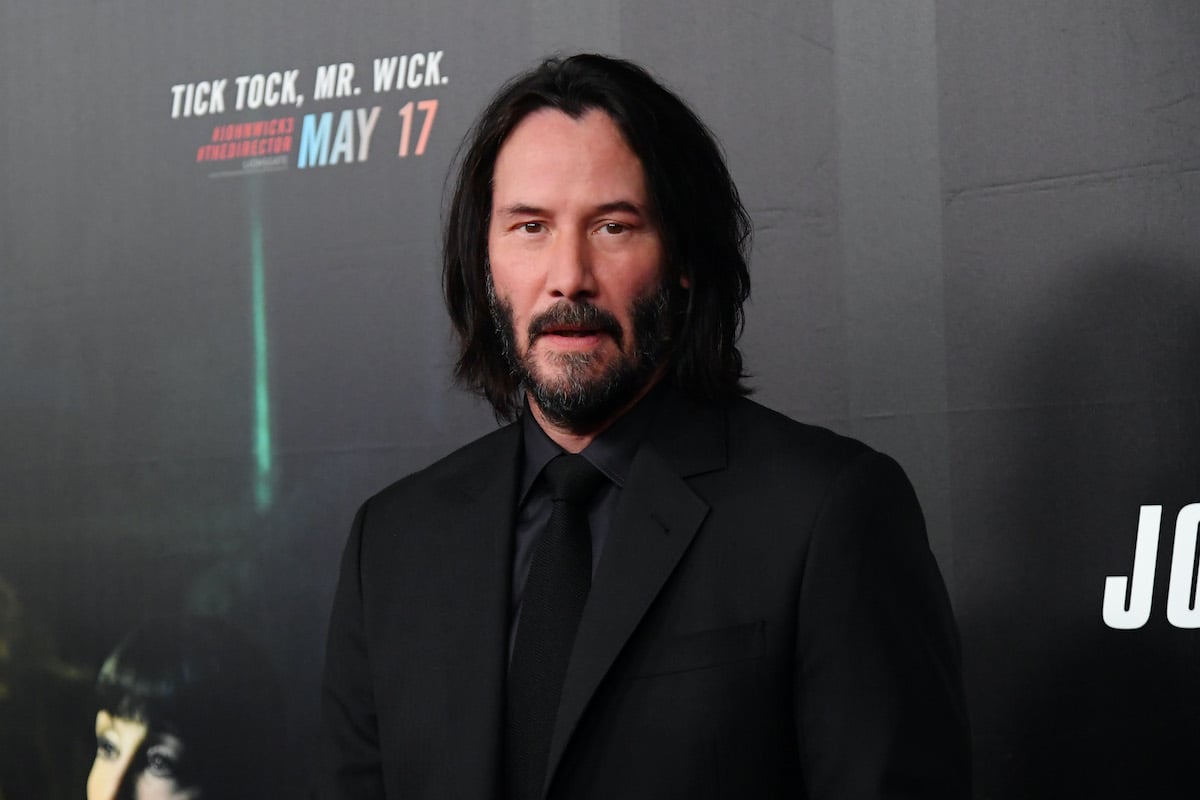 Keanu Reeves looking at the camera