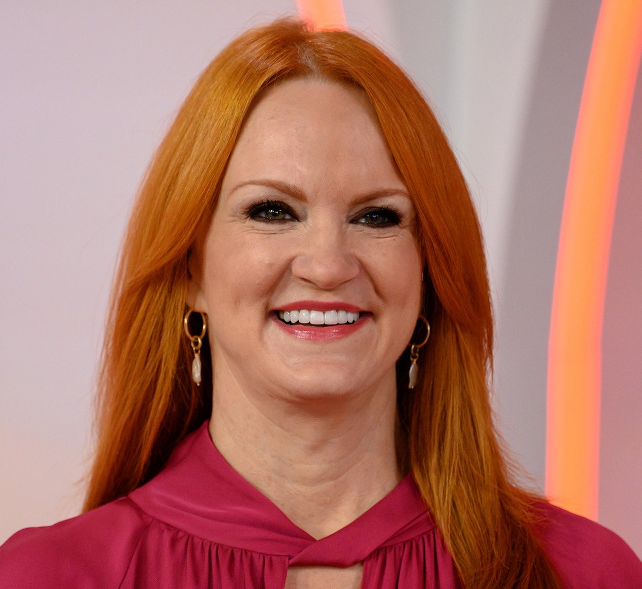 Ree Drummond smiles wearing a pink top