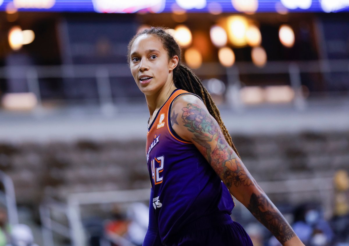 Brittney Griner smiling on a basketball court