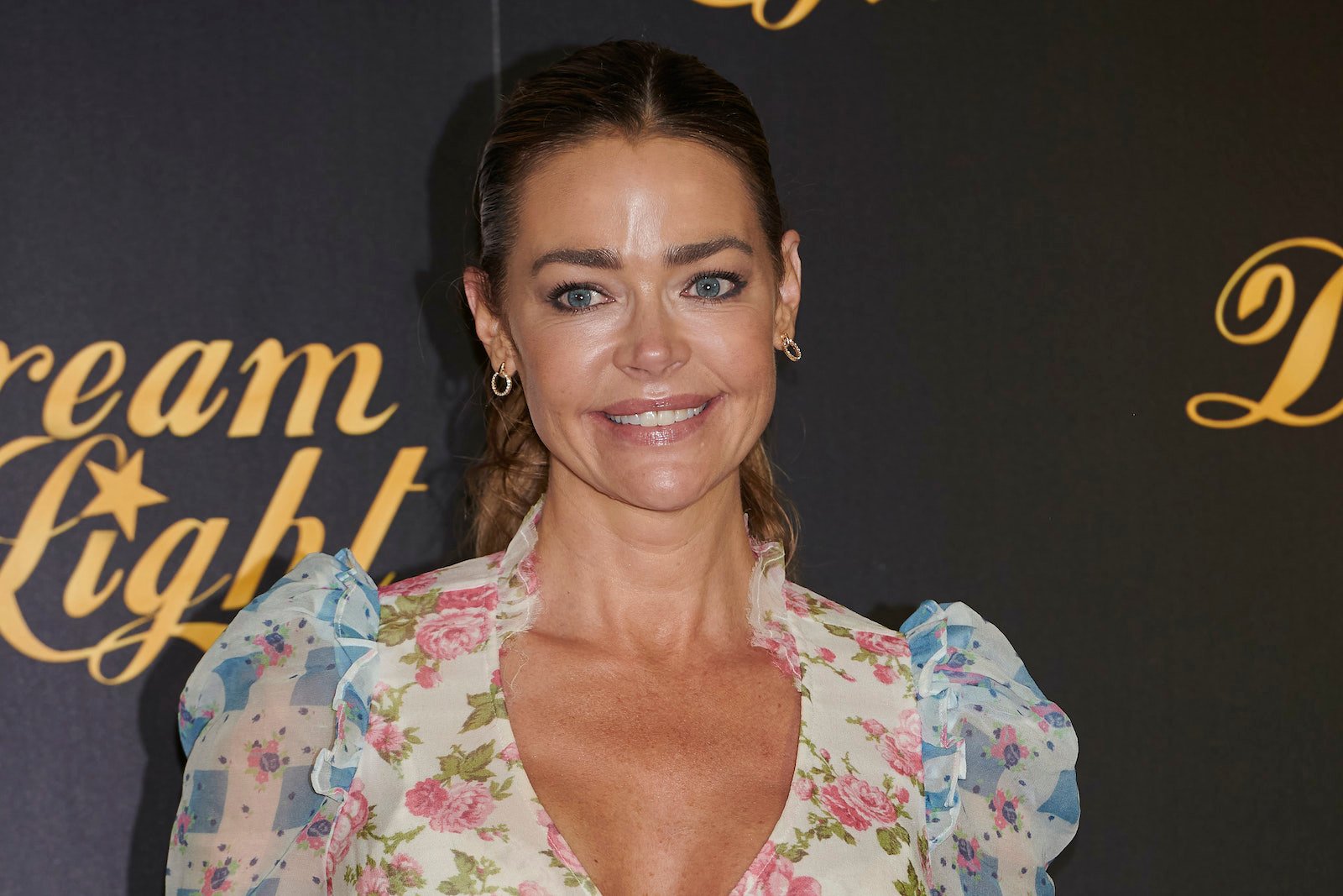 Denise Richards attends the 'Glow and Darkness' presentation