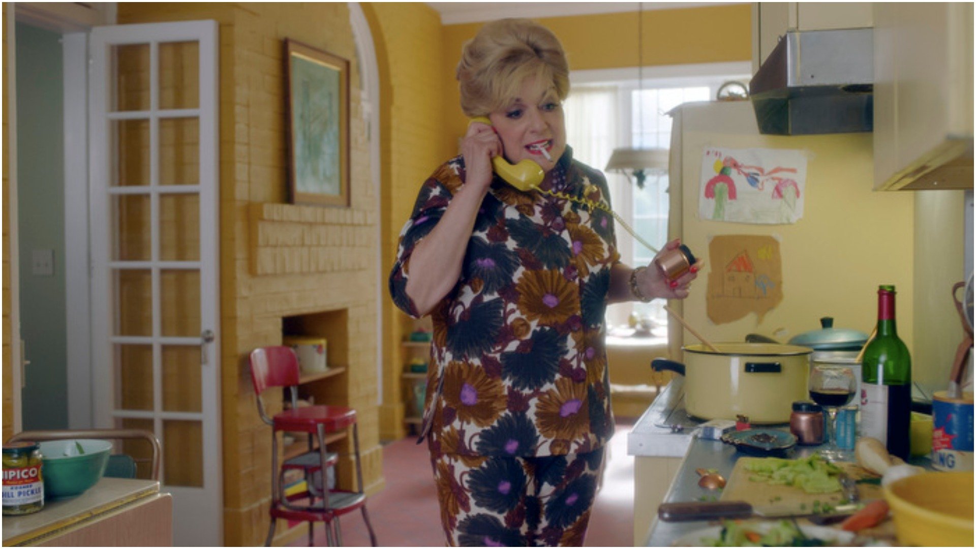 Caroline Aaron as Shirley Maisel in 'The Marvelous Mrs. Maisel' answers the phone with cigarette in her mouth