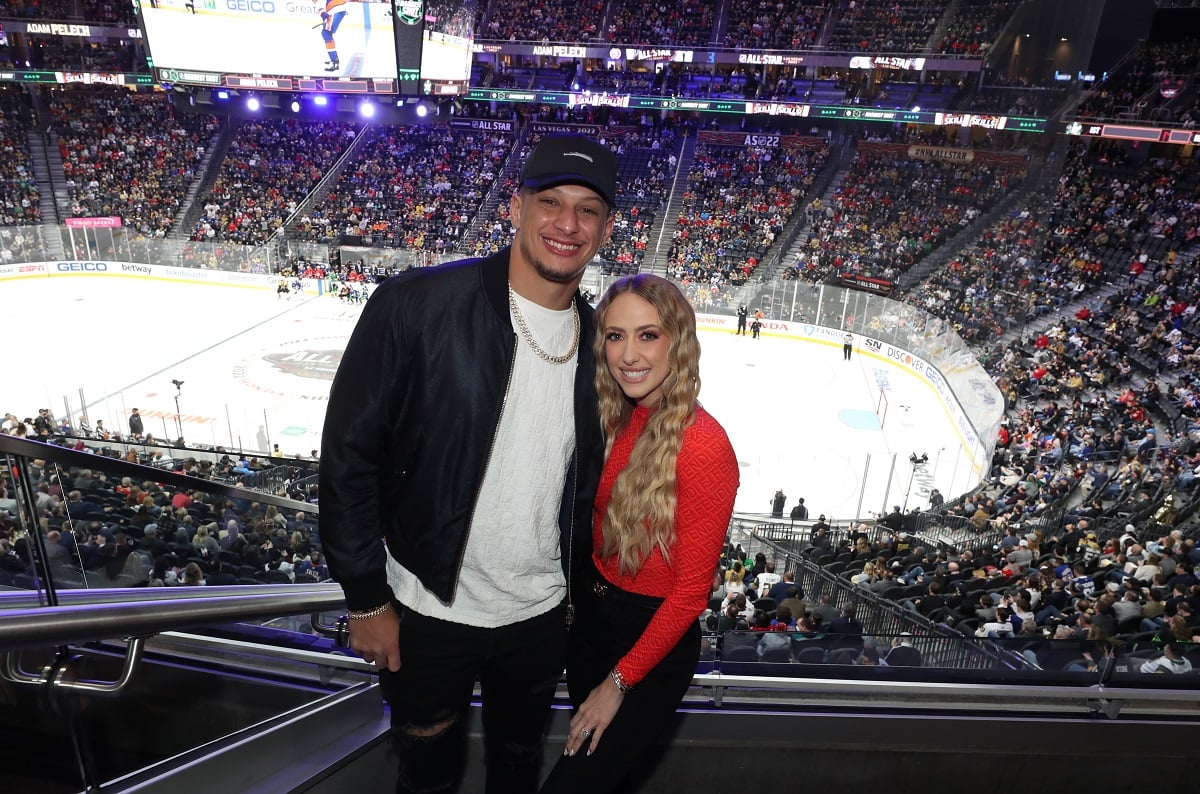 Patrick Mahomes and Brittany Matthews pose for photo at the 2022 NHL All-Star Skills event