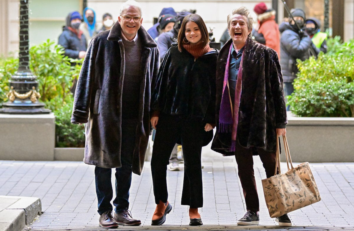 Steve Martin, Selena Gomez and Martin Short smile as they stand together on the set of 'Only Murders in the Building'