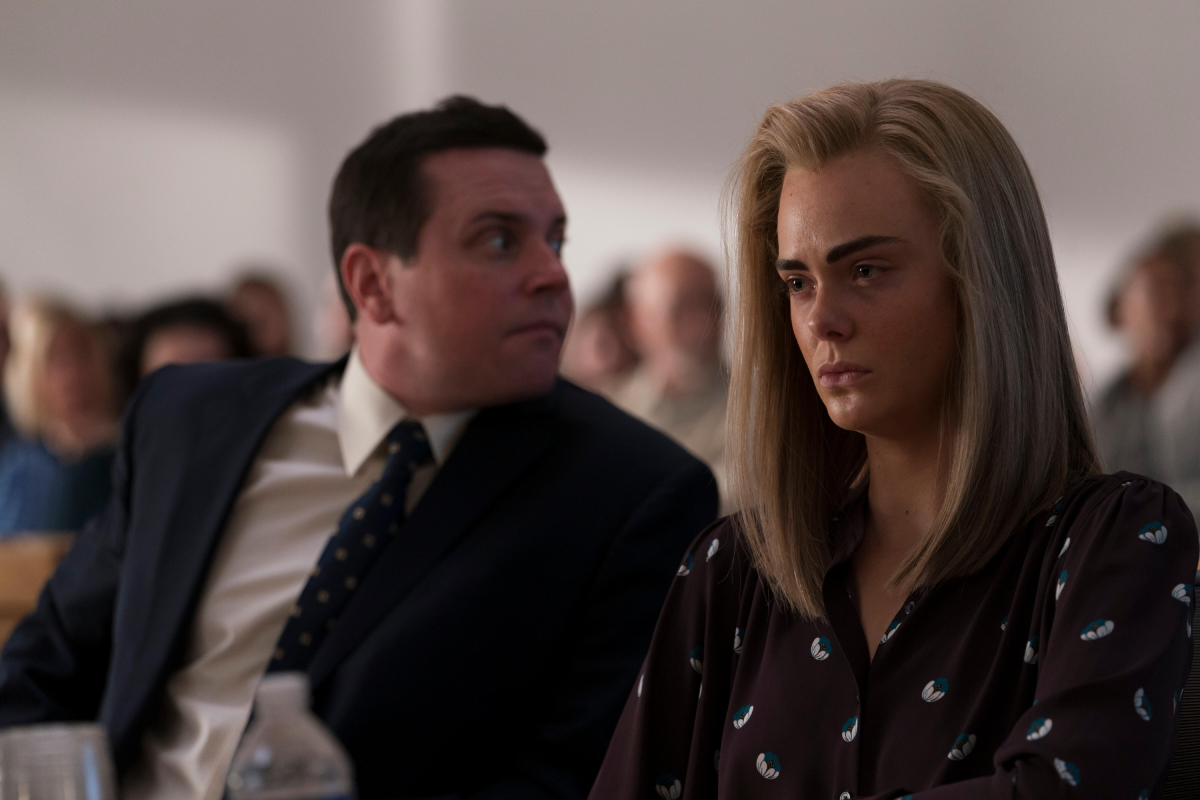 Joseph Cataldo (Michael Mosley) and Michelle Carter (Elle Fanning) in The Girl from Plainville. Michelle sits in court.