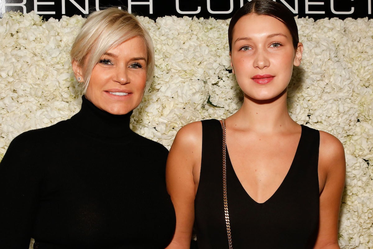 Yolanda Hadid and Bella Hadid pose together at an event.