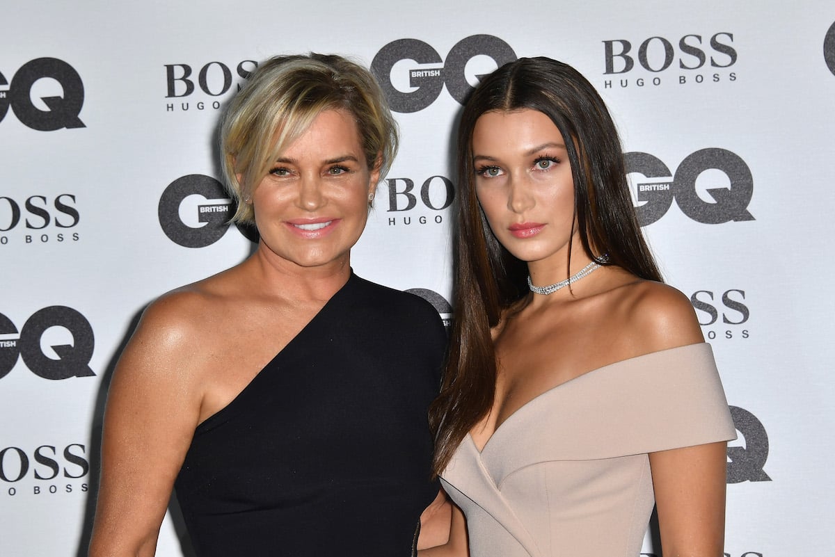 Yolanda Hadid and Bella Hadid pose together at an event.