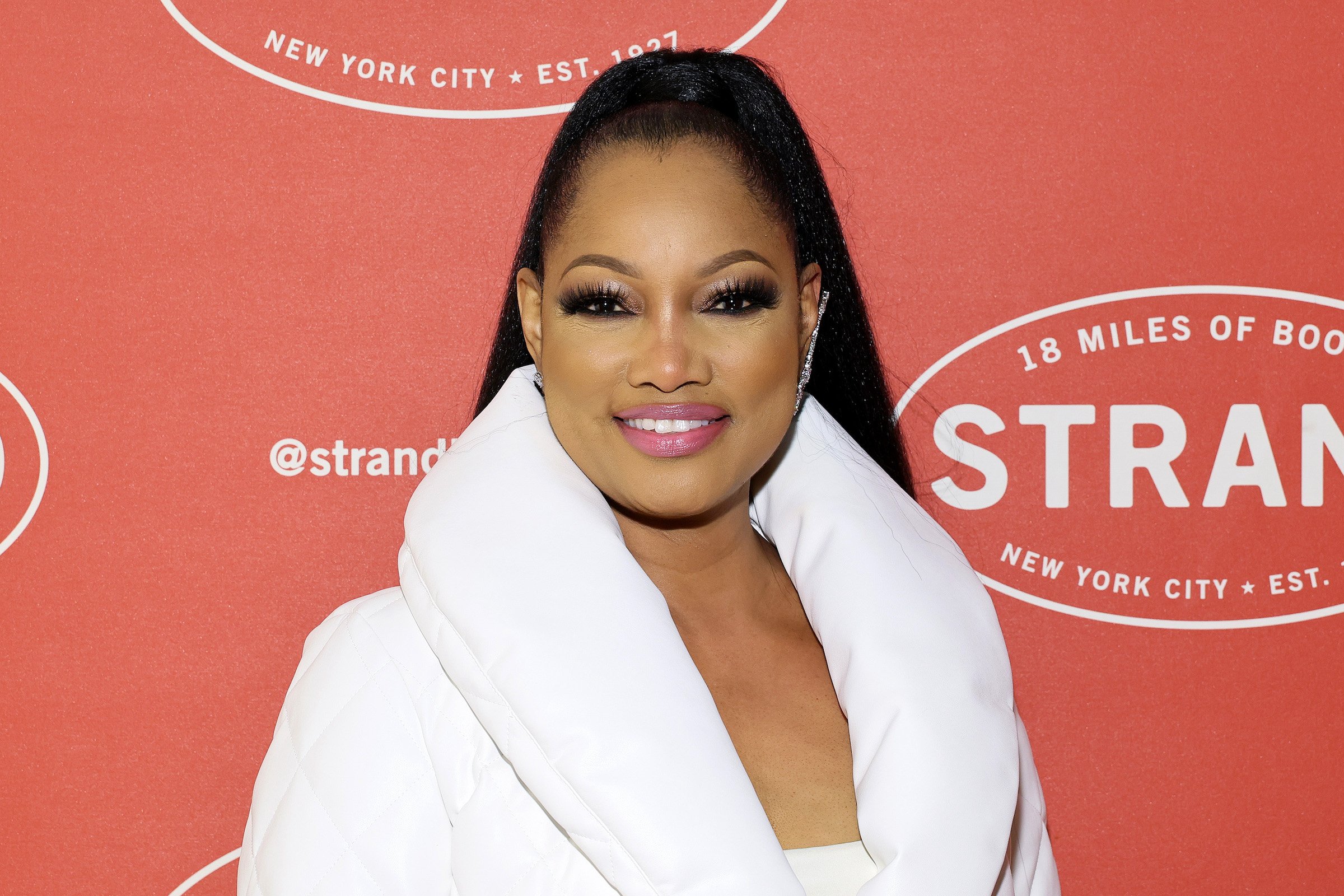 Garcelle Beauvais wearing a white fur coat