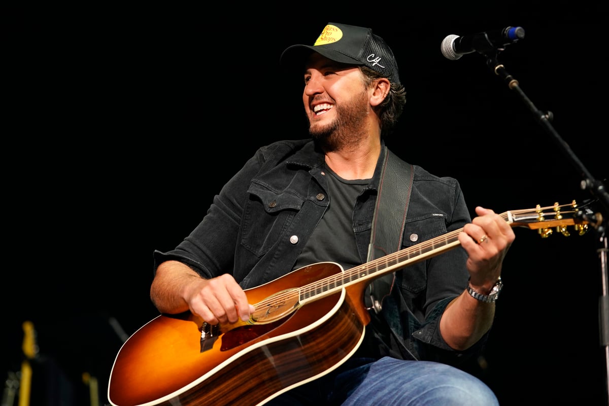 Luke Bryan smiles while performing onstage at the Bass Pro Shops 50th Anniversary Concert in Springfield, MO.