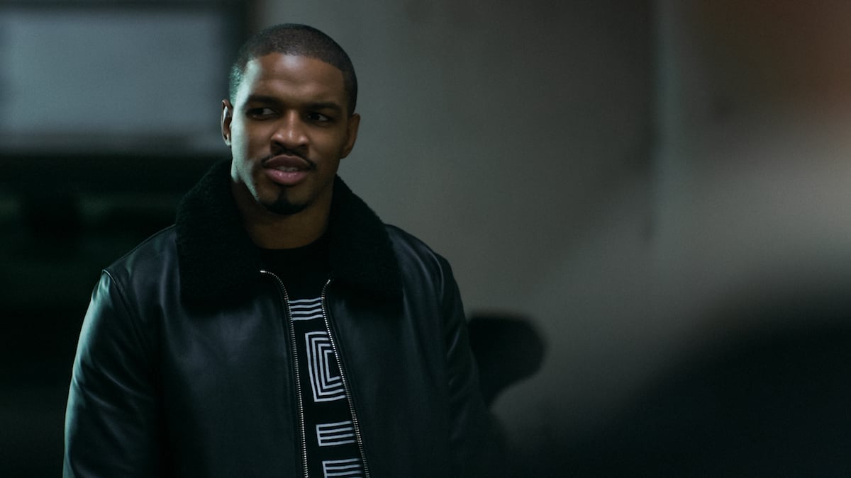 Michael J. Ferguson of 'Power' and 'Power Book II: Ghost' appears in a scene as his character 2-Bit wearing a leather jacket and scowling