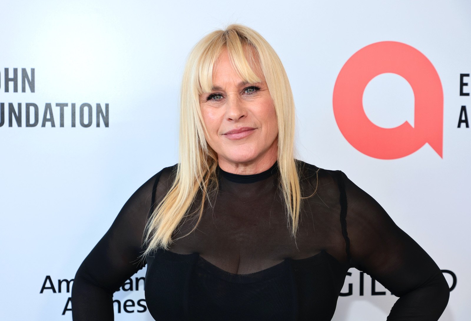 Patricia Arquette poses on the step and repeat at the Elton John AIDS Foundation's 30th Annual Academy Awards Viewing Party 