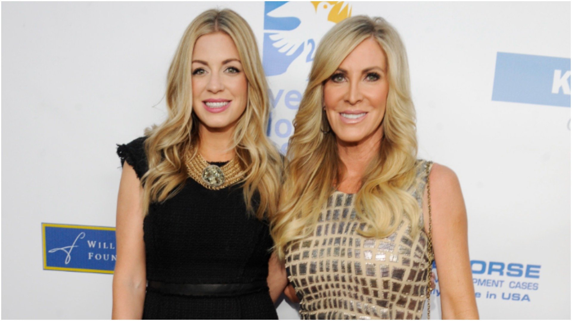 Ashley Zarlin and Lauri Peterson from 'RHOC' smile for a photo at an event in 2013