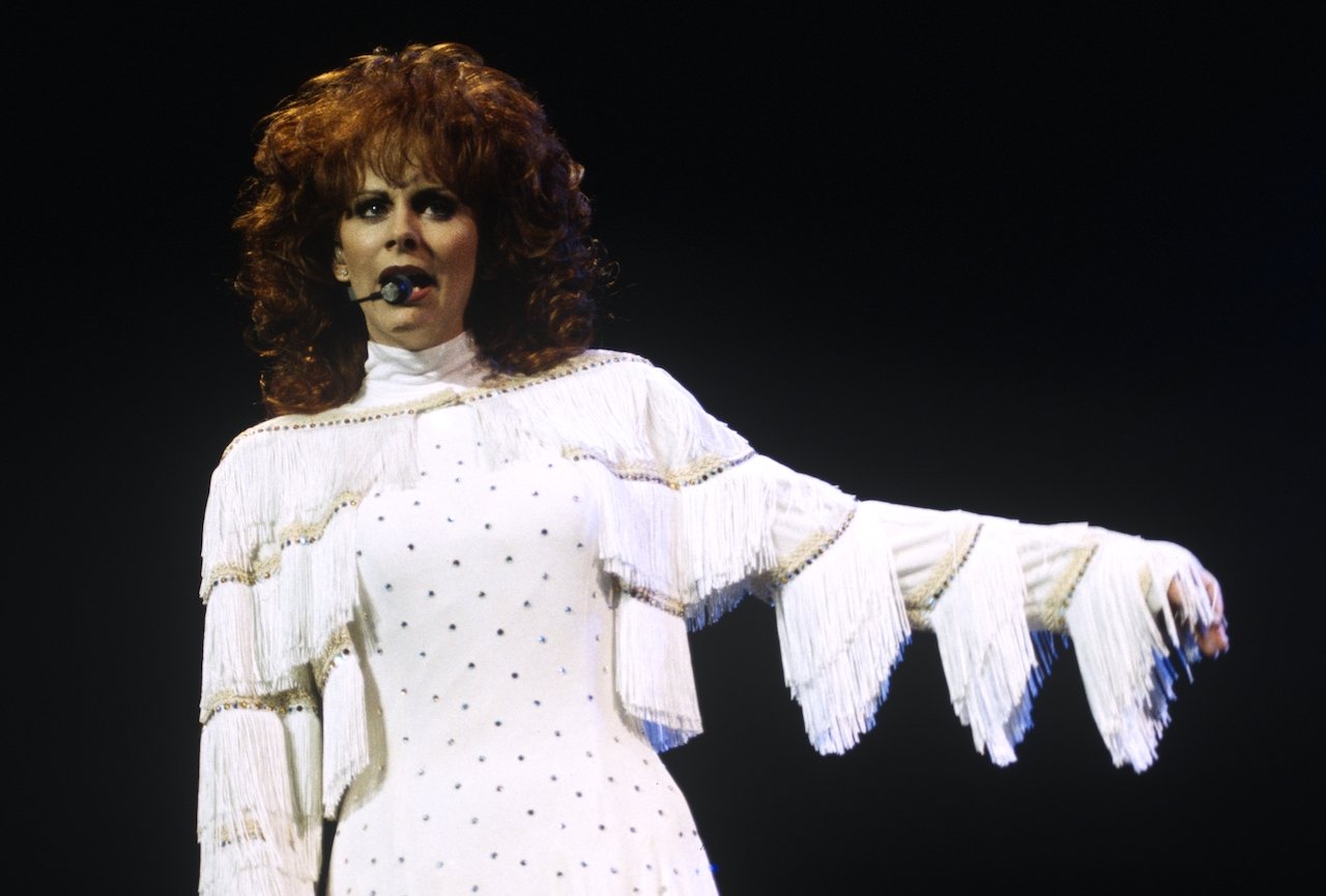 Reba McEntire in a white fringe dress