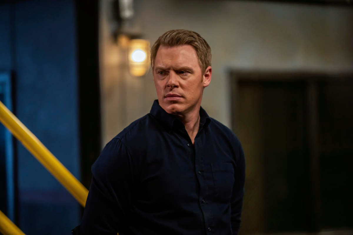 Donald Ressler wearing a button-up shirt in The Blacklist Season 9.