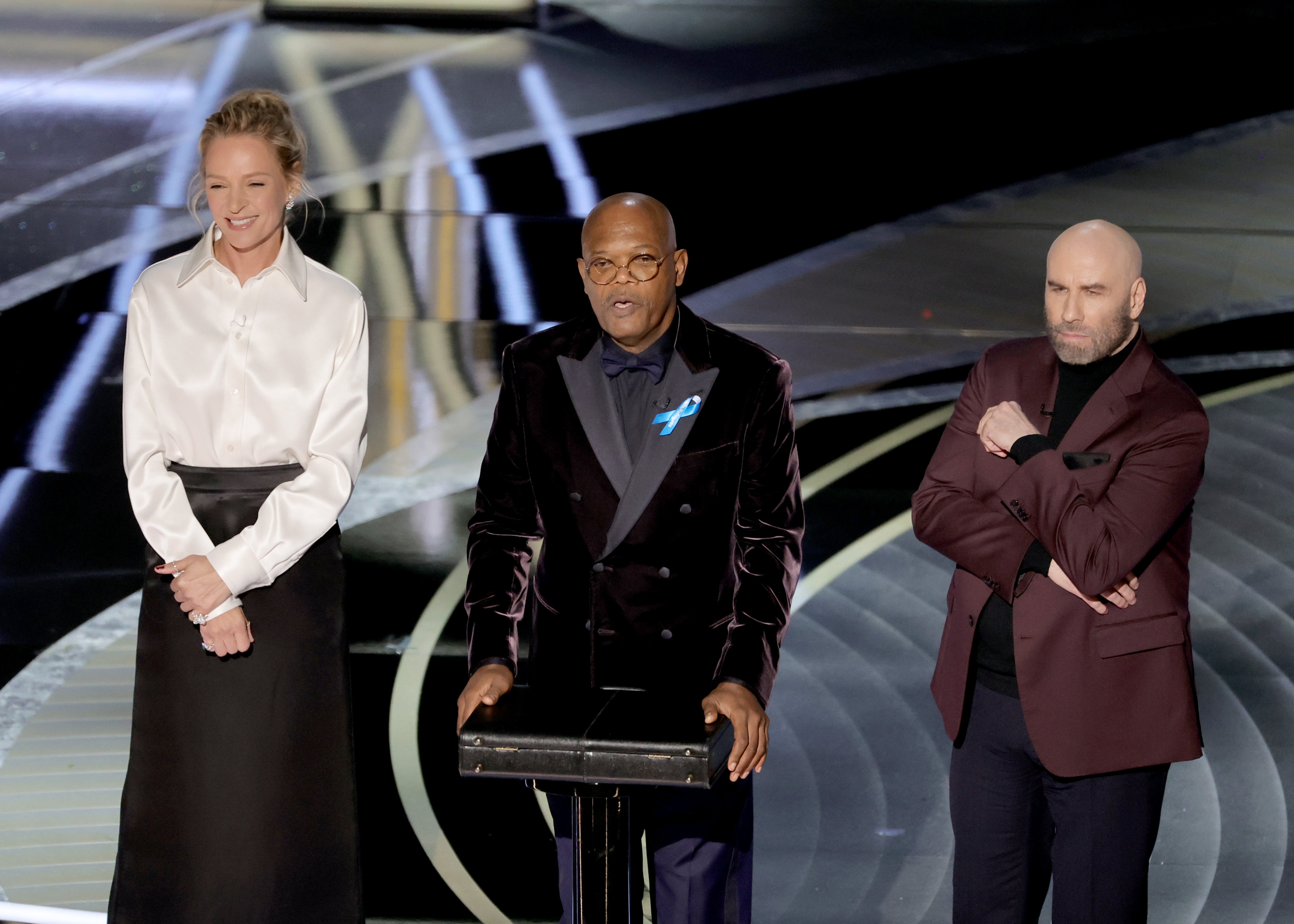Uma Thurman, Samuel L. Jackson, and John Travolta from Pulp Fiction present at the Academy Awards