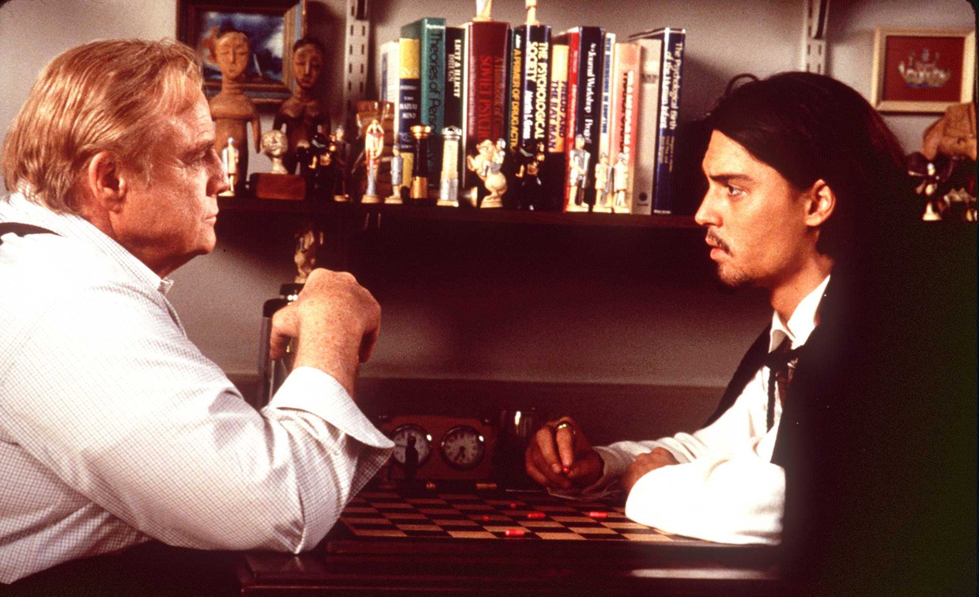 'Don Juan DeMarco' Marlon Brando as Dr. Jack Mickler and Johnny Depp as Don Juan DeMarco sitting across from one another wearing white shirts