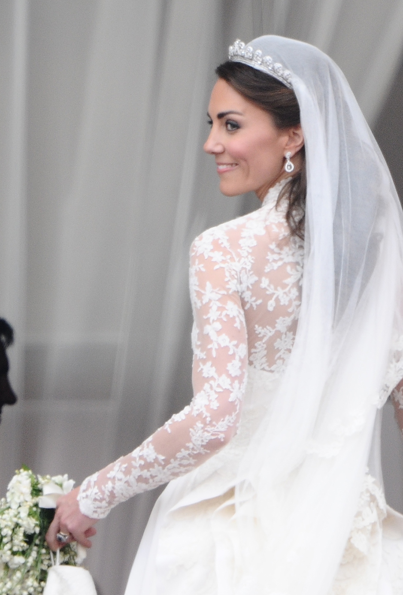 Kate Middleton Turns And Smiles As She Leaves The Balcony On Her Wedding Day ?w=693&h=1024