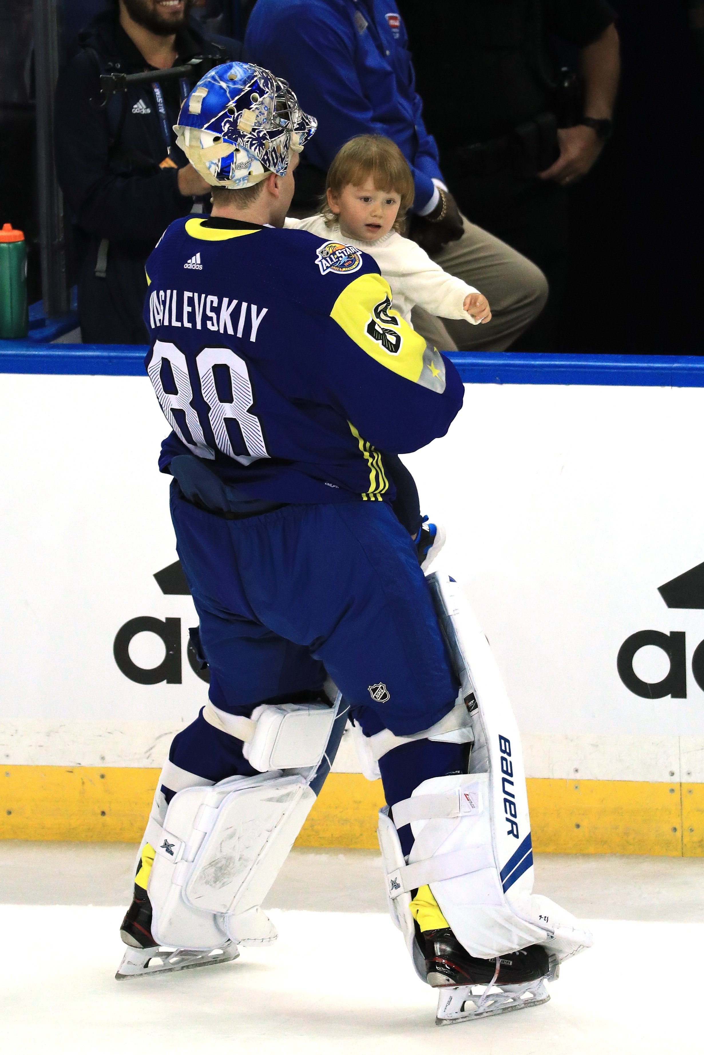 Andrei Vasilevskiy takes his son around the rink after a game