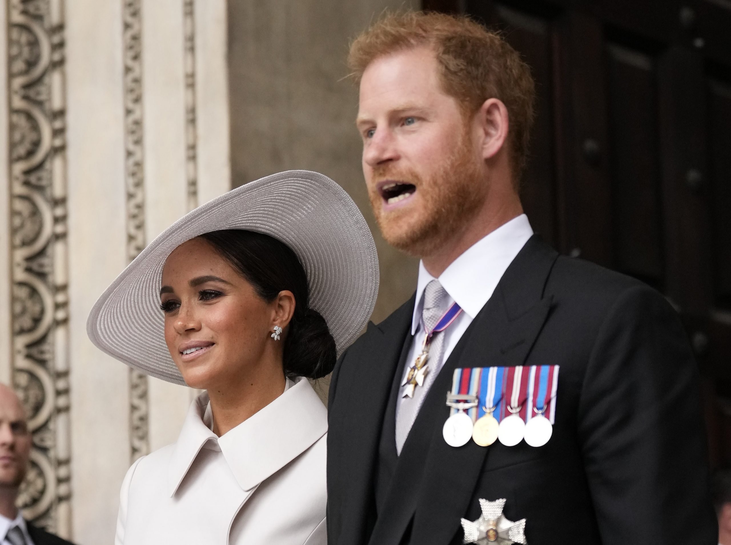 Meghan Markle and Prince Harry, who is keeping his family at a distance until after his book comes out, depart the National Service of Thanksgiving to Celebrate the Platinum Jubilee