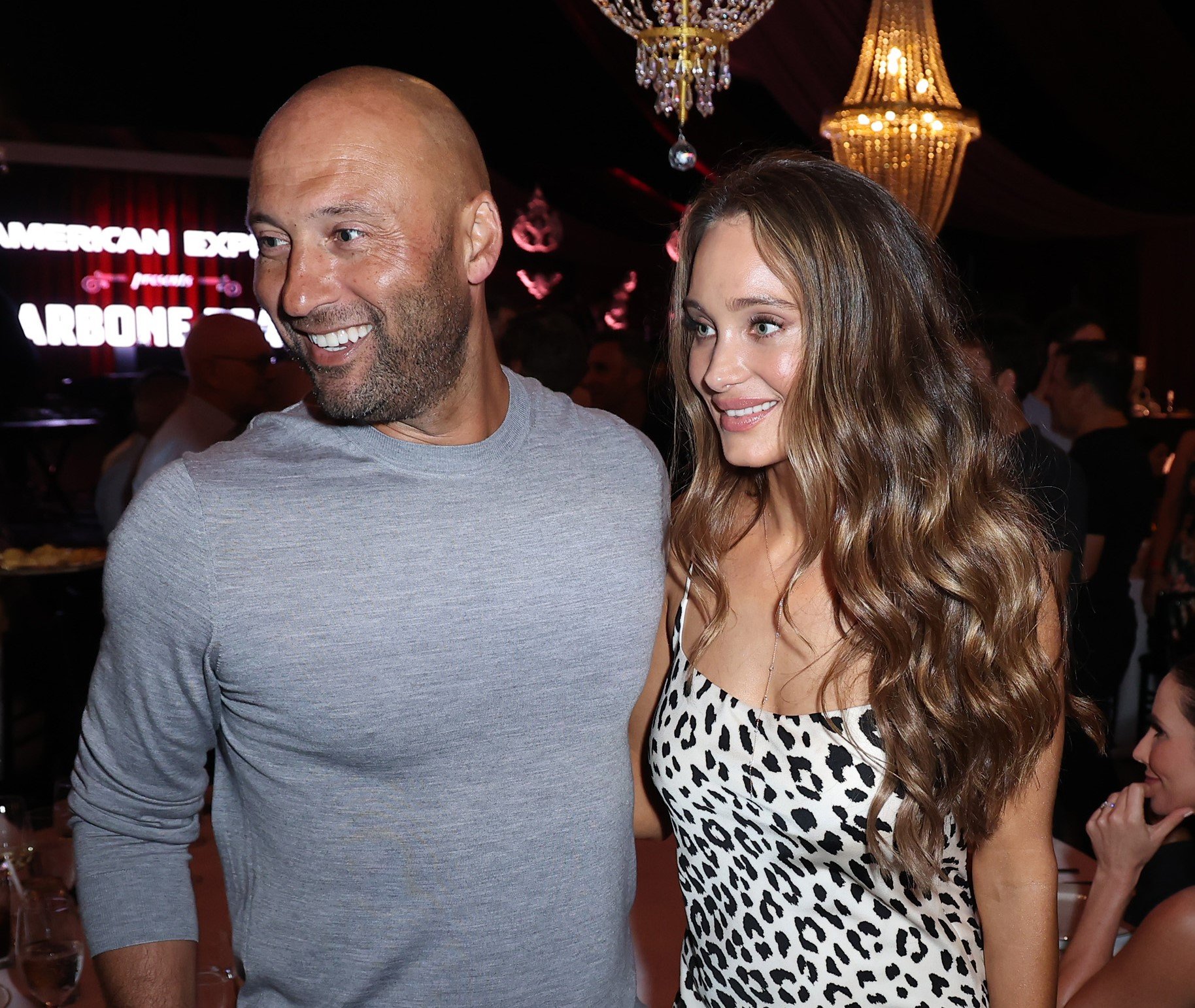 Derek Jeter And Hannah Davis Jeter Who Has A Her Own Impressive Net Worth Attend American Express Presents CARBONE Beach In Miami 