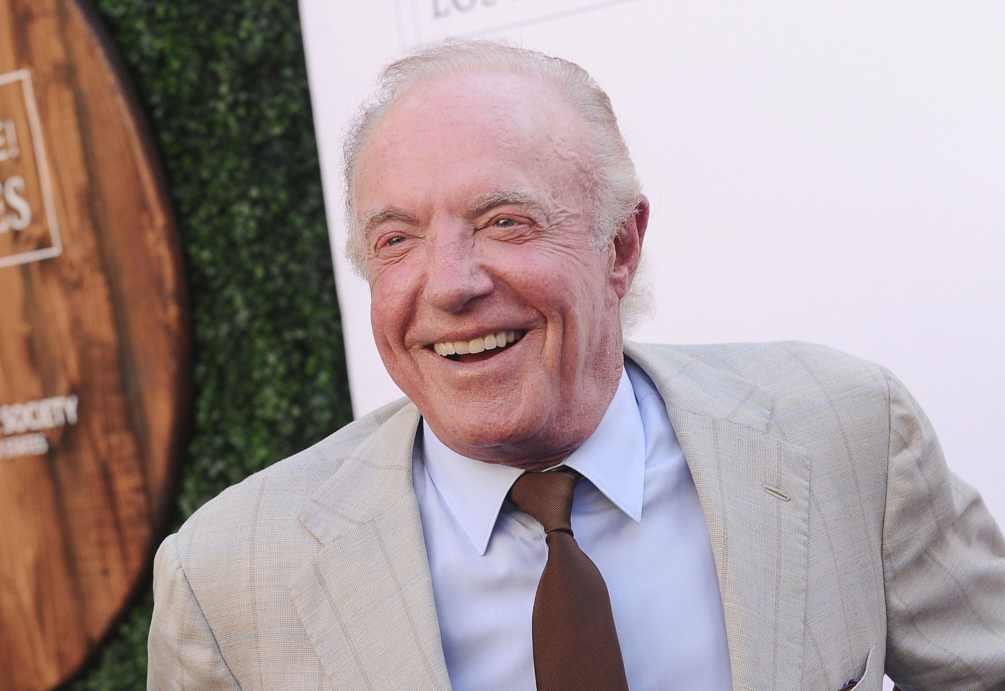 James Caan, who stormed off David O. Russell movie set, smiling and wearing a tan suit jacket