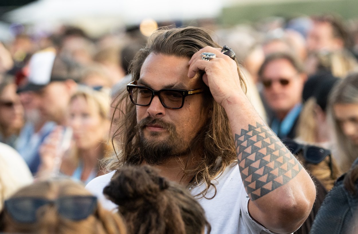 Jason Mamoa attends a The Rolling Stones concert on July 3, 2022. Momoa had a traffic accident with a motorcycle in July 2022, but several other actors cheated death after their motorcycle accident.