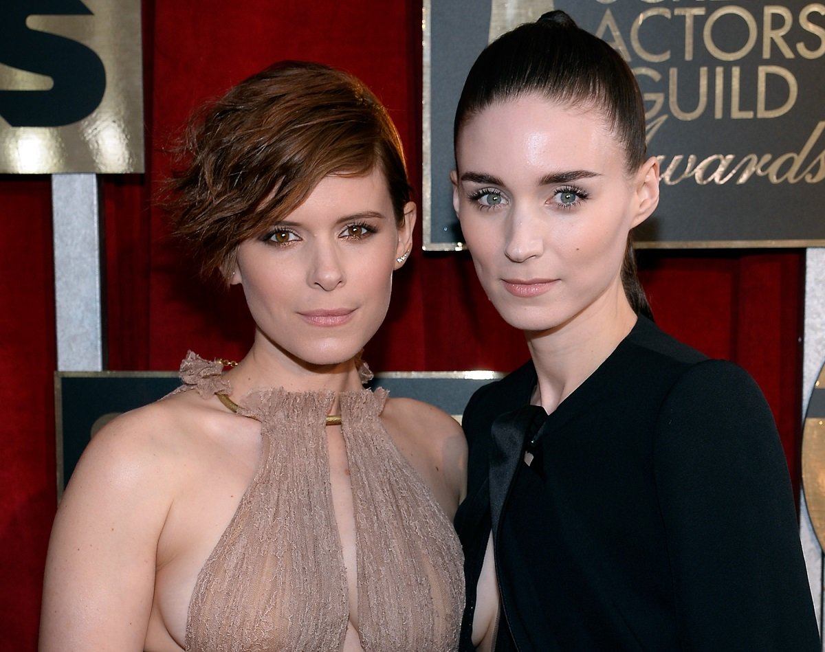 Sisters Kate and Rooney Mara, who are both vegans, posing together in formal attire