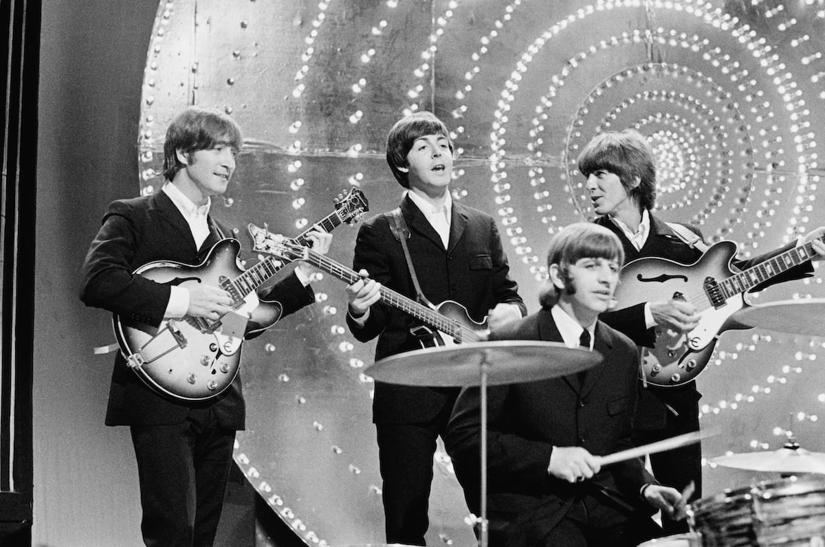 The Beatles performing in 1966