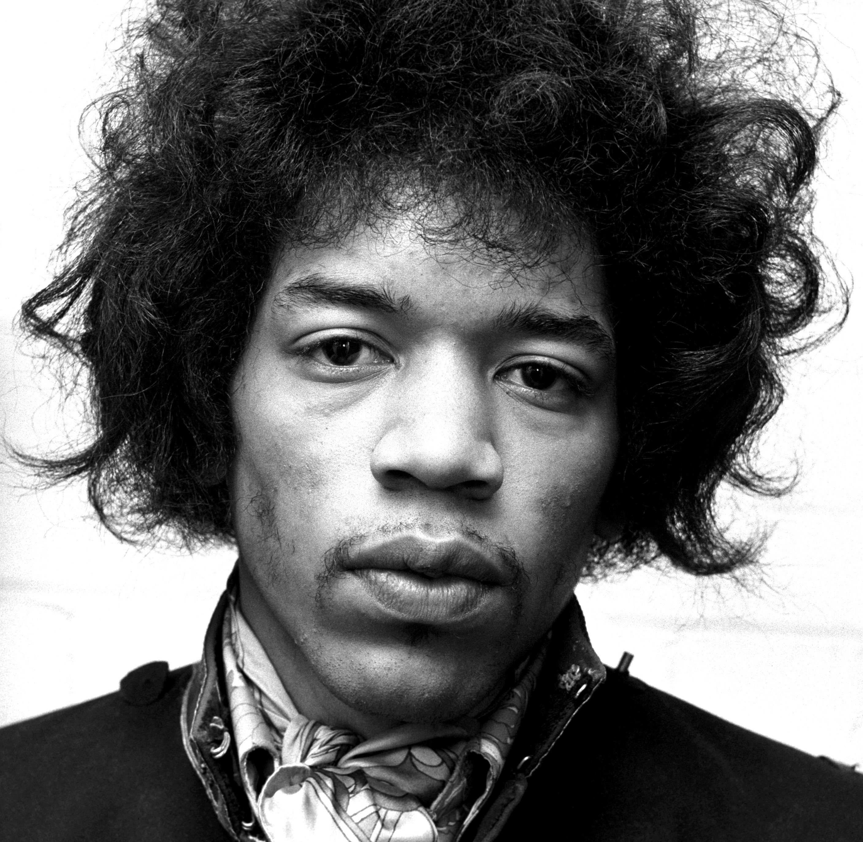 Jimi Hendrix looking at a camera during the "Foxy Lady" and "Purple Haze" era