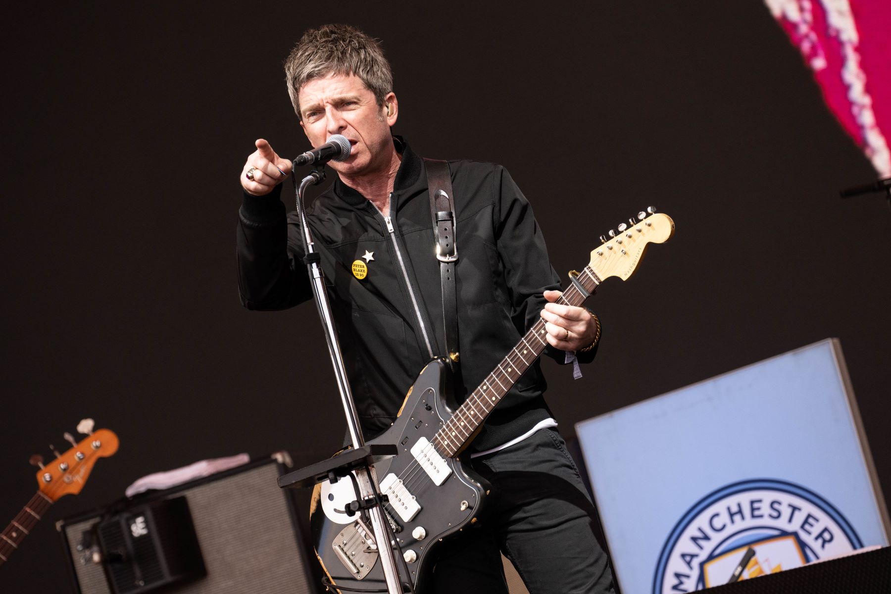 Noel Gallagher performing on The Pyramid Stage at Worthy Farm in Glastonbury, England