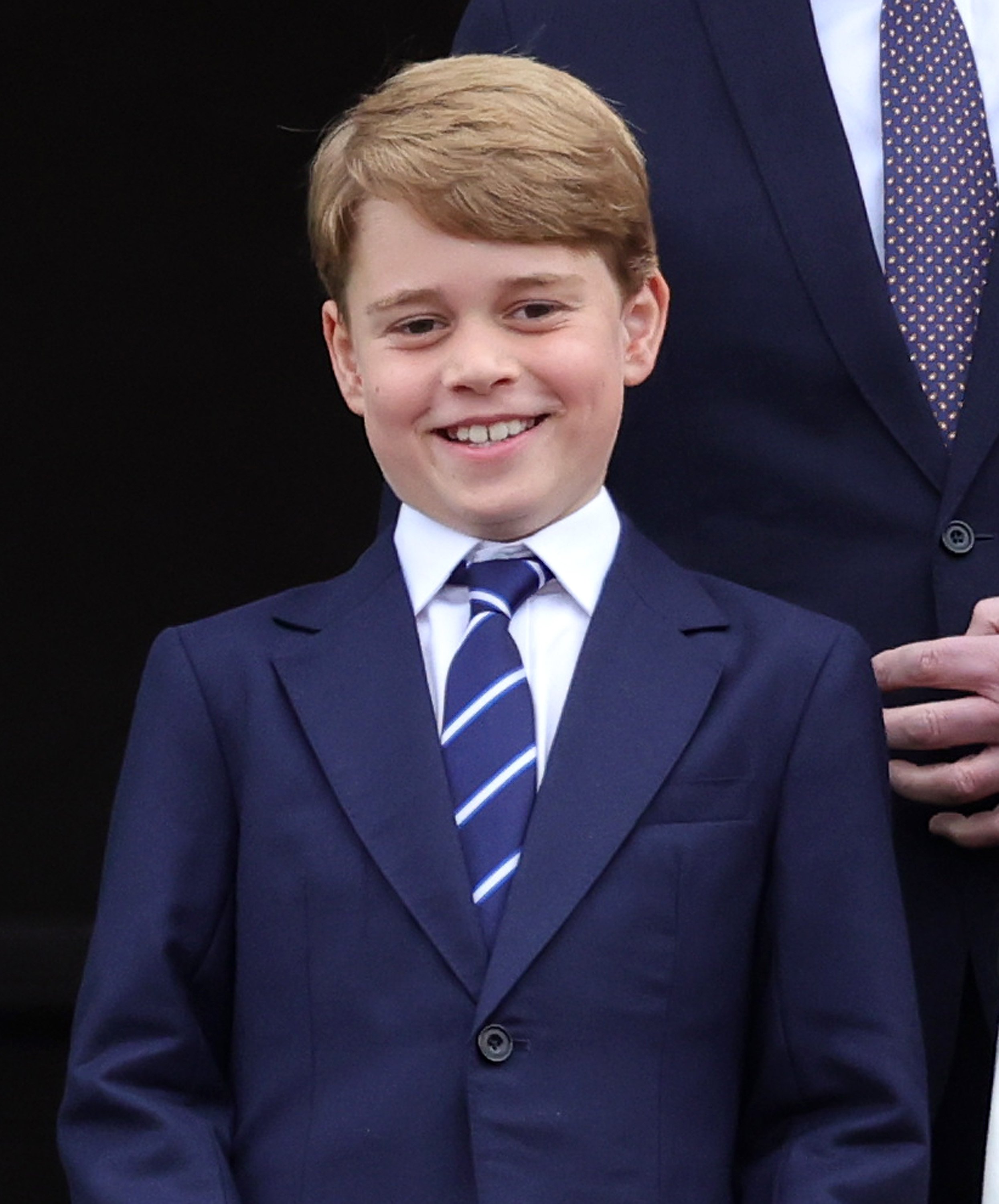 Prince George smiling on the balcony of Buckingham Palace during the Platinum Jubilee Pageant