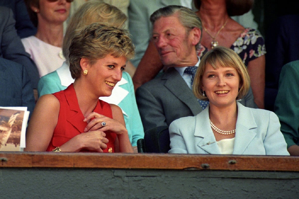 Princess Diana chatting with her best friend Julia Samuel in the royal box at Wimbledon in 1994