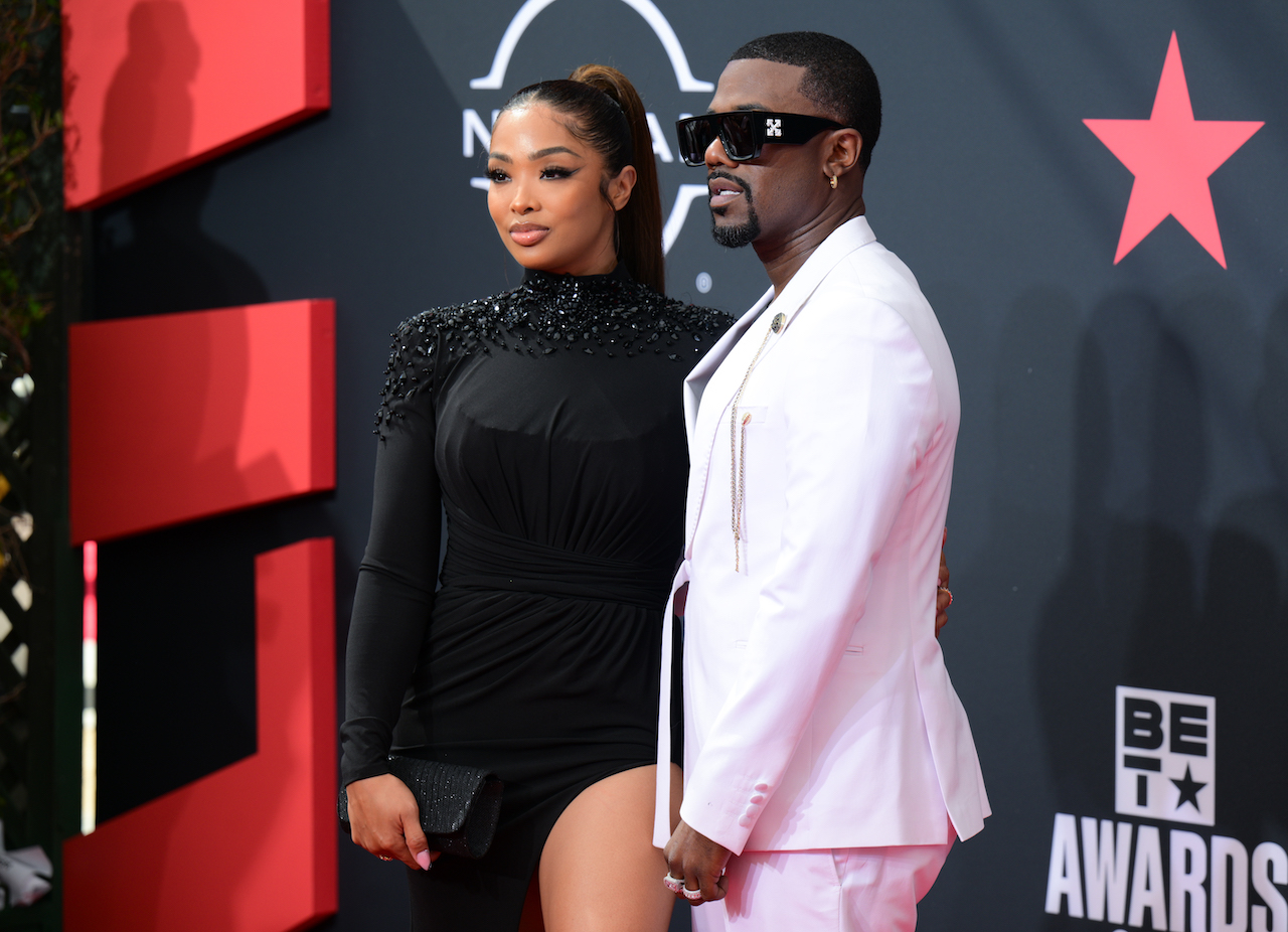 Princess Love and Ray J pose together on red carpet; Ray downplays his cheating in their marriage