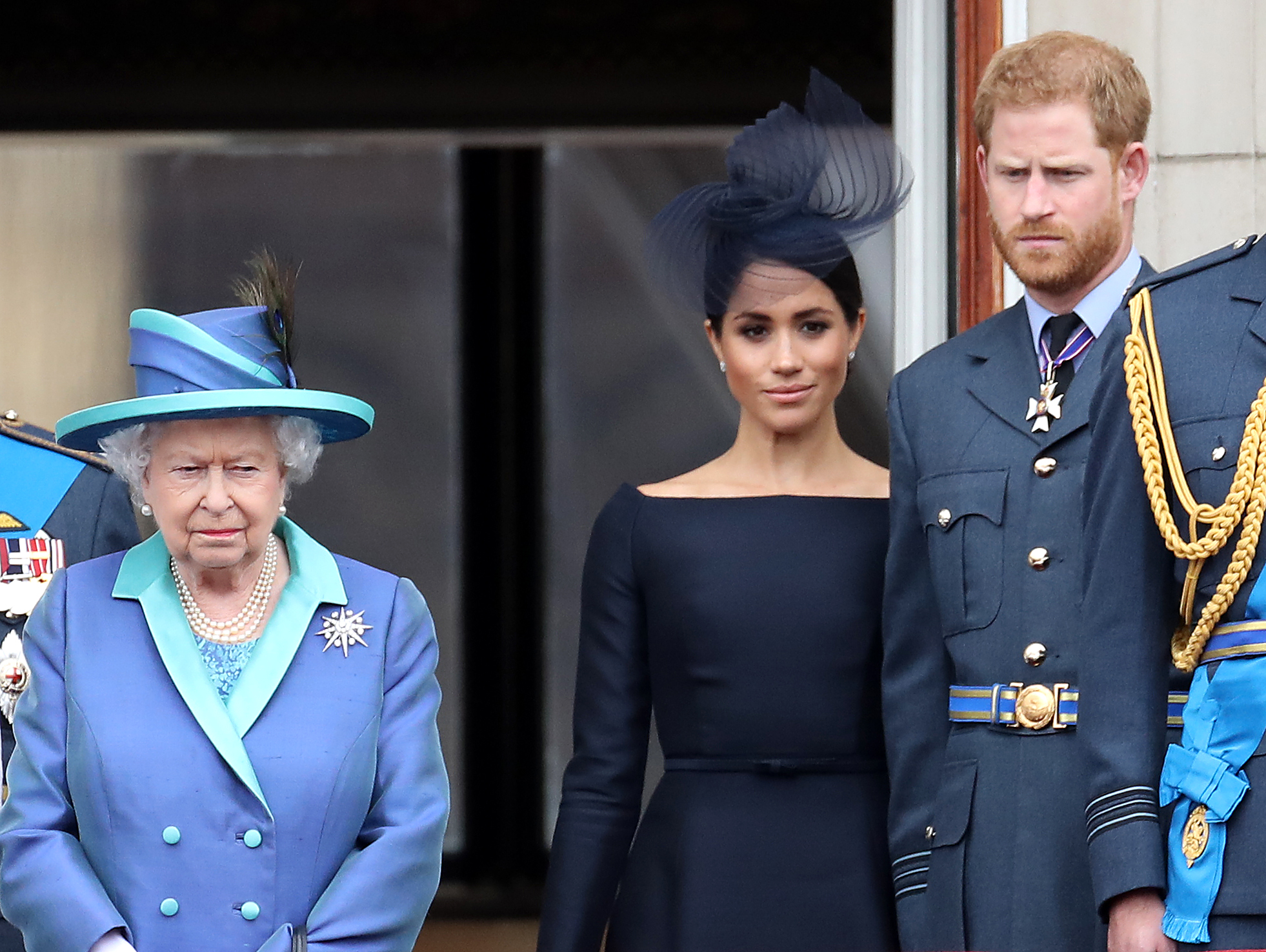 Queen Elizabeth II, Prince Harry, and Meghan Markle on the balcony of Buckingham Palace