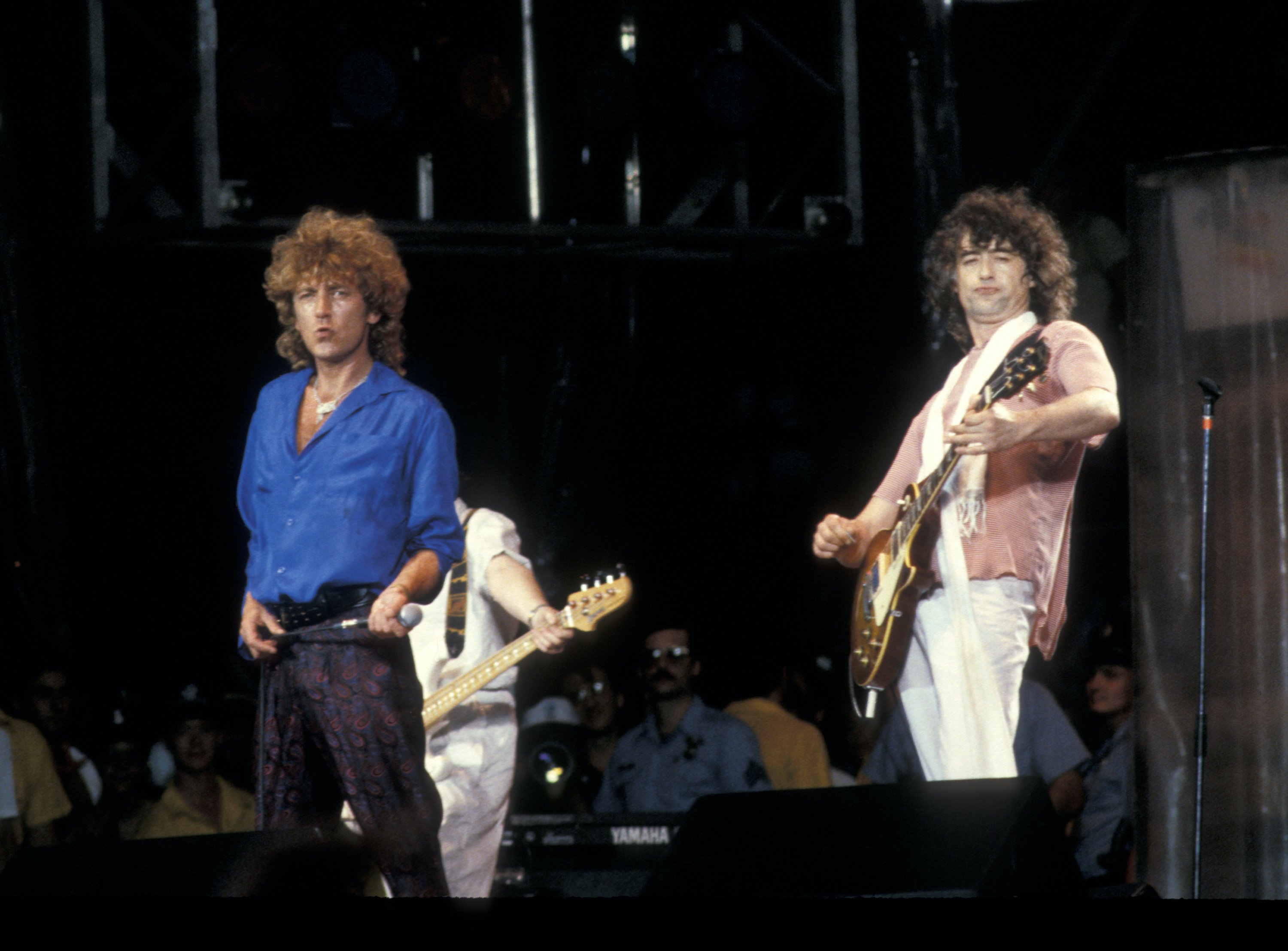 Robert Plant and Jimmy Page of Led Zeppelin perform their songs at Live Aid in 1985