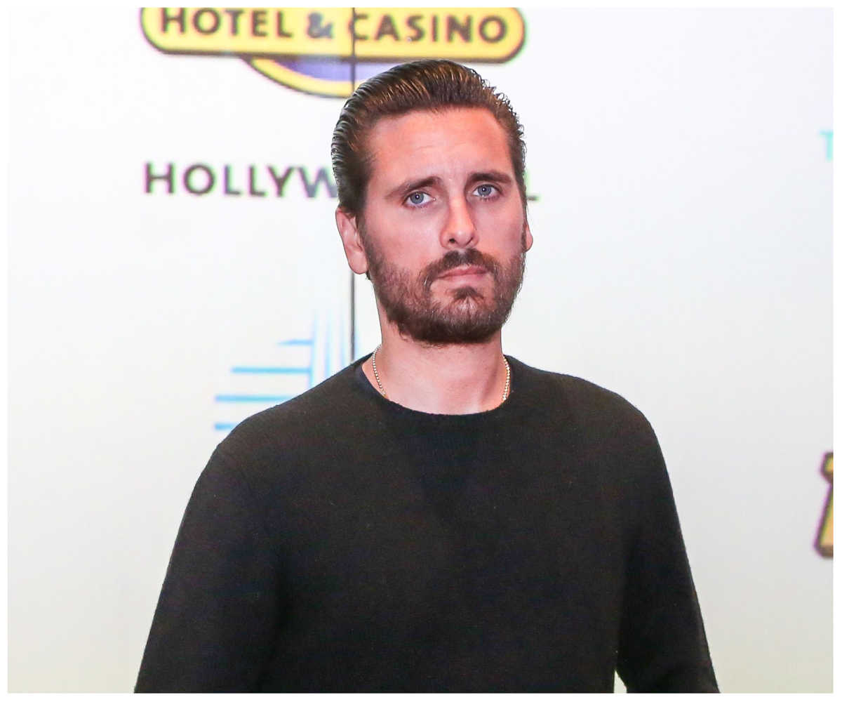 Scott Disick, who was recently in a serious car accident, poses at an event.
