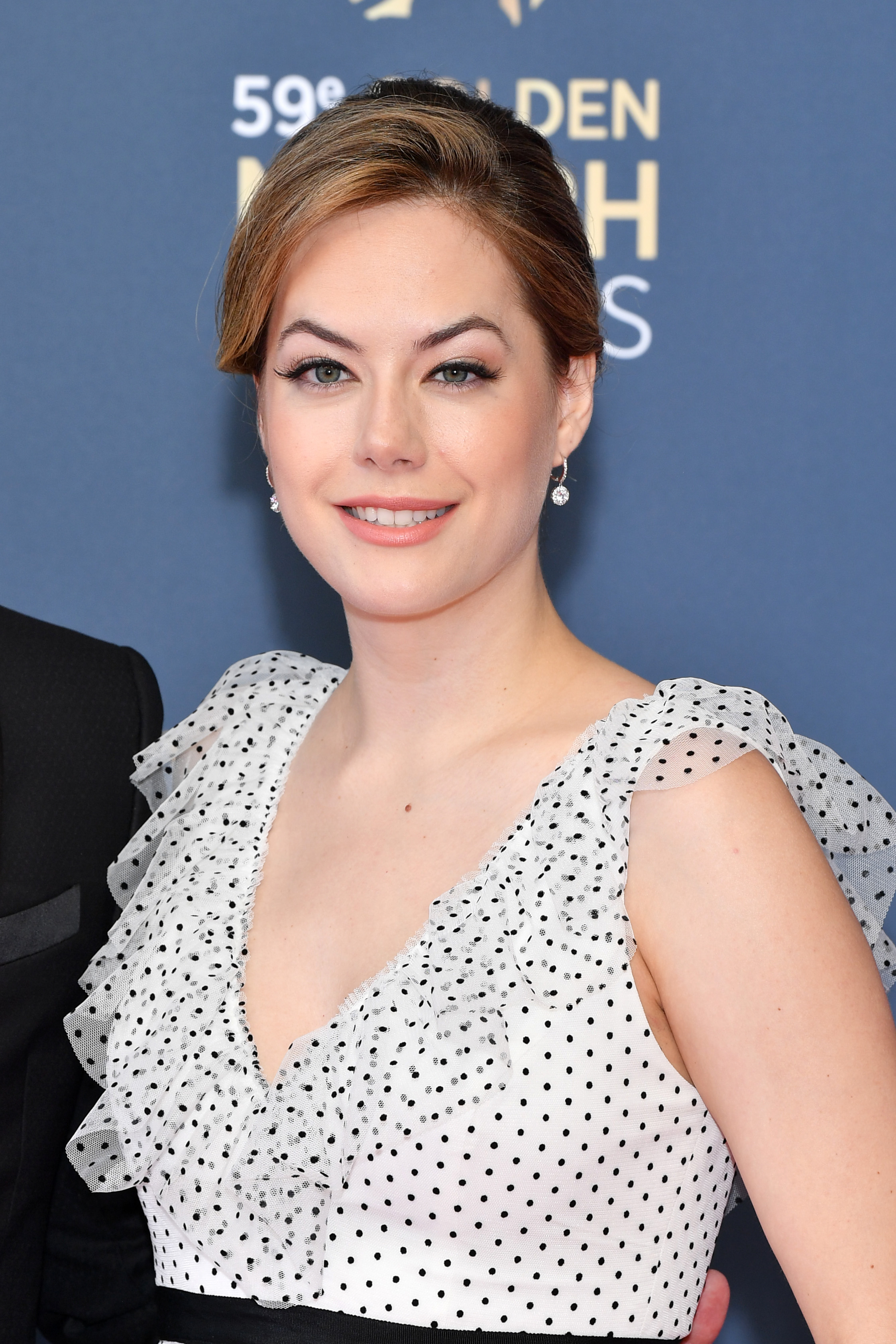 'The Bold and the Beautiful' star Annika Noelle wearing a black and white polka dot dress, poses for photographers.