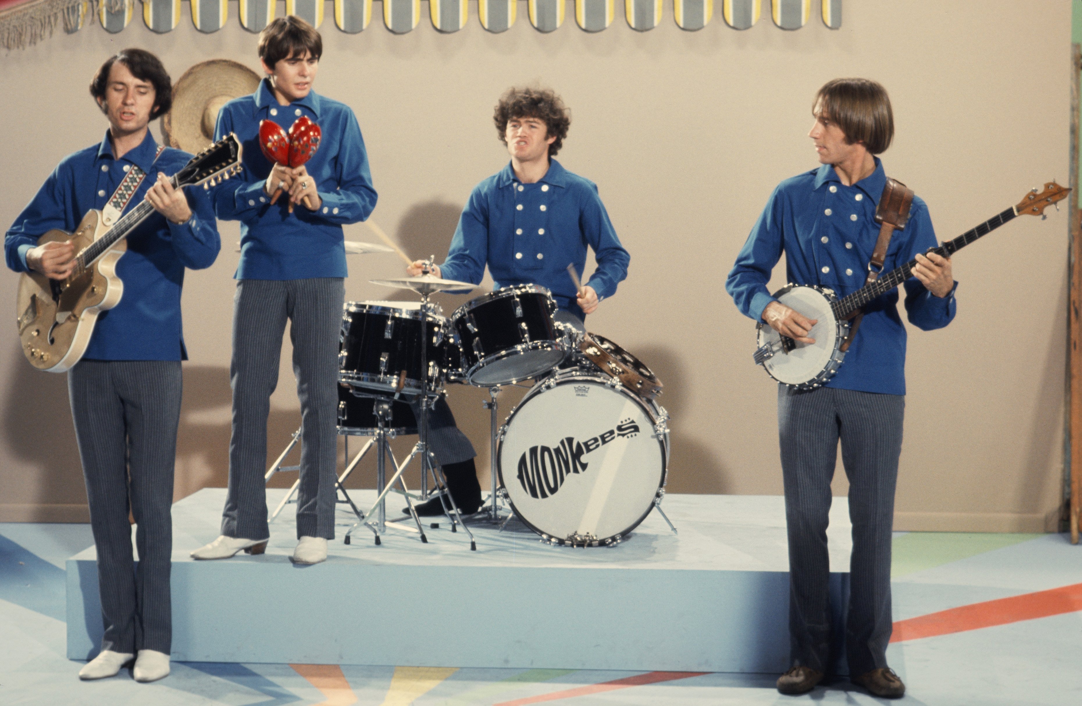 Mike Nesmith, Davy Jones, Micky Dolenz, and Peter Tork wearing blue during The Monkees' "Valleri" era