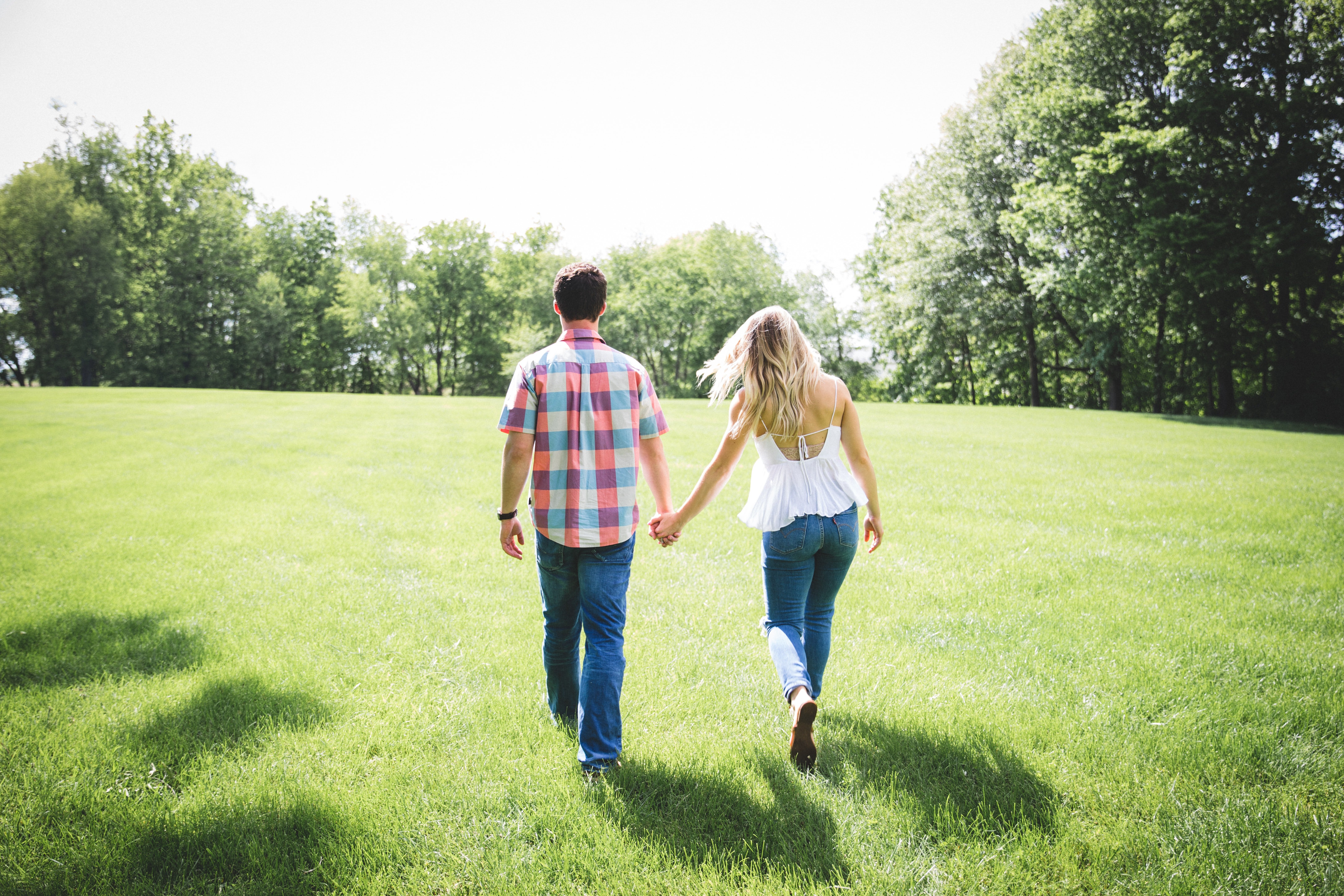 Couple holding hands.