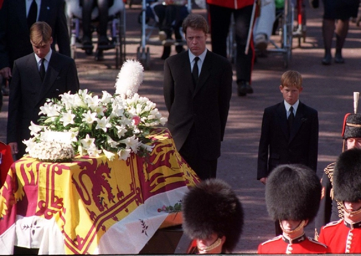 Prince William, Charles Spencer, and Prince Harry walking behind Princess Diana's coffin | Adam Butler - PA Images/PA Images via Getty Images