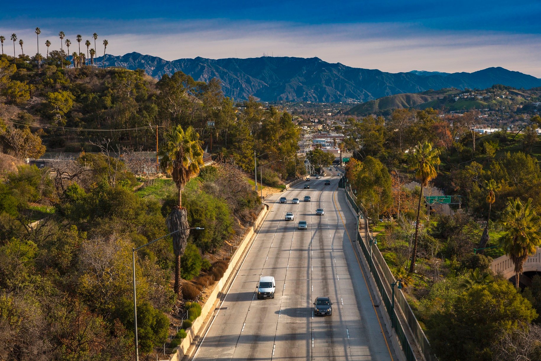 Pasadena Freeway, Arroyo Seco Parkway, CA 110 leads to downtown Los Angeles in morning light.