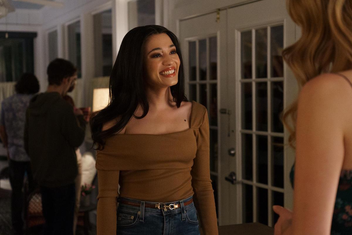 Alicia Crowder smiles wearing a brown shirt in 'Tell Me Lies' Season 1 Episode 2: 'Hot-Blooded'