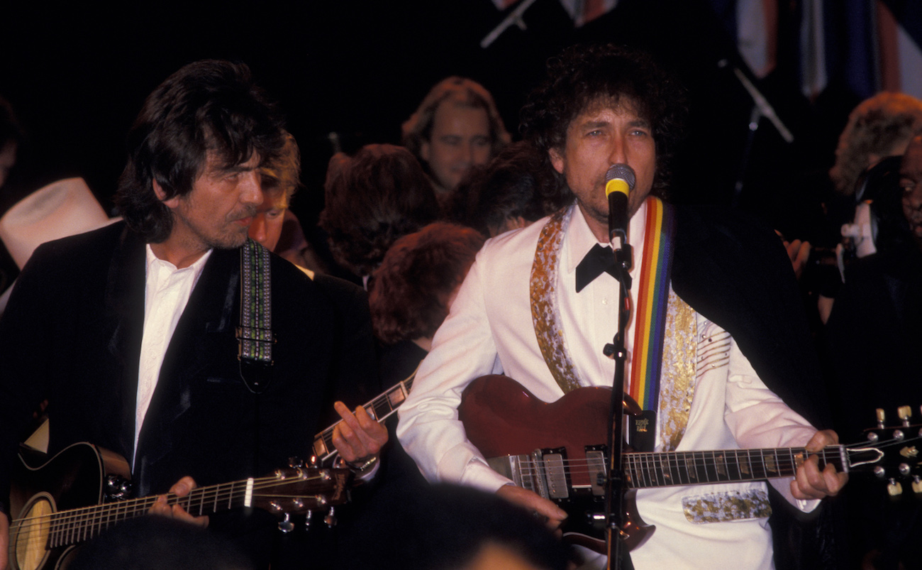 George Harrison and Bob Dylan performing at the 1988 Rock & Roll Hall of Fame inductions. 