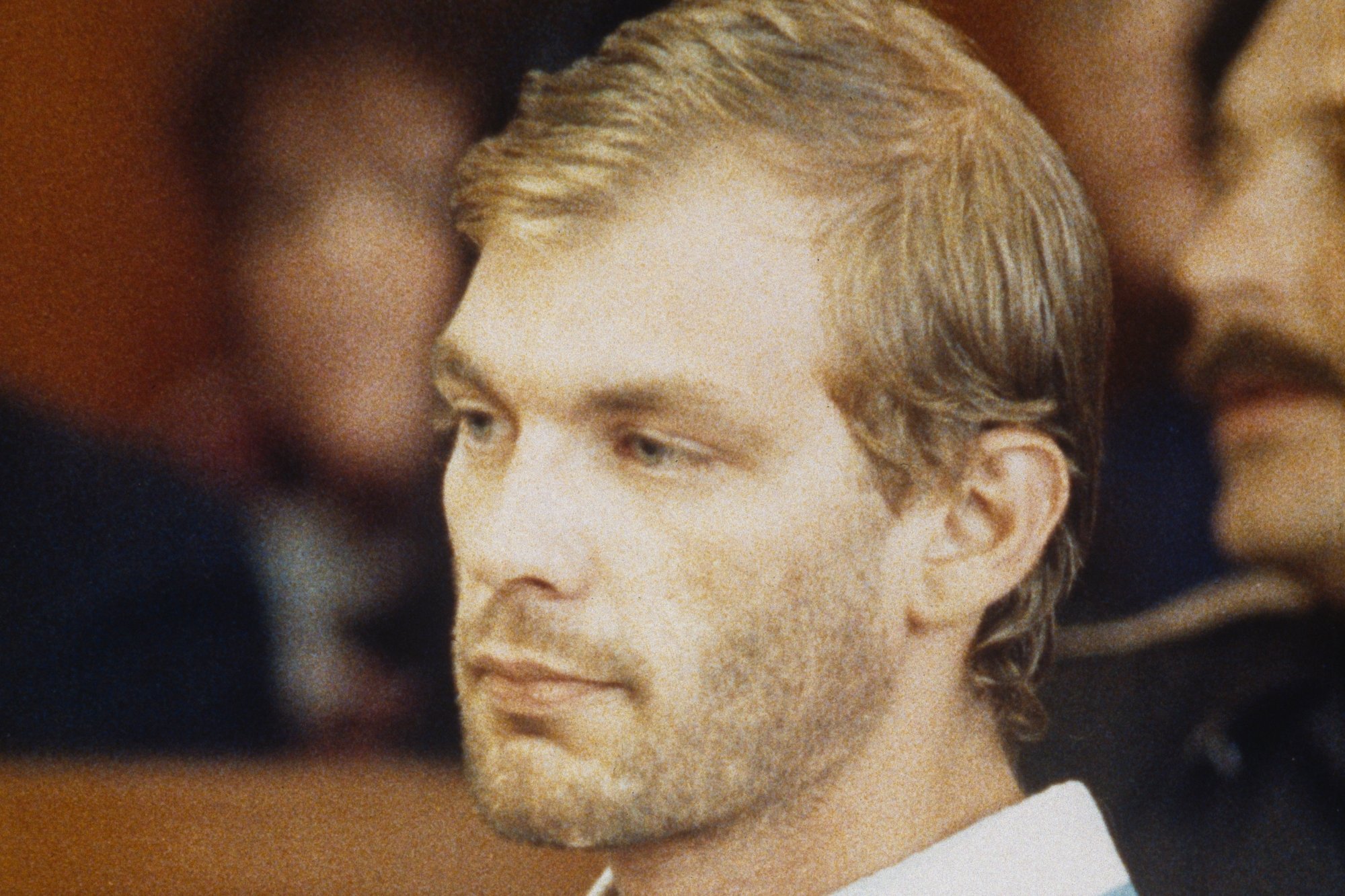 Jeffrey Dahmer, who had 'private cemetery'. He's wearing a white,collared shirt with a serious look on his face looking straight ahead.