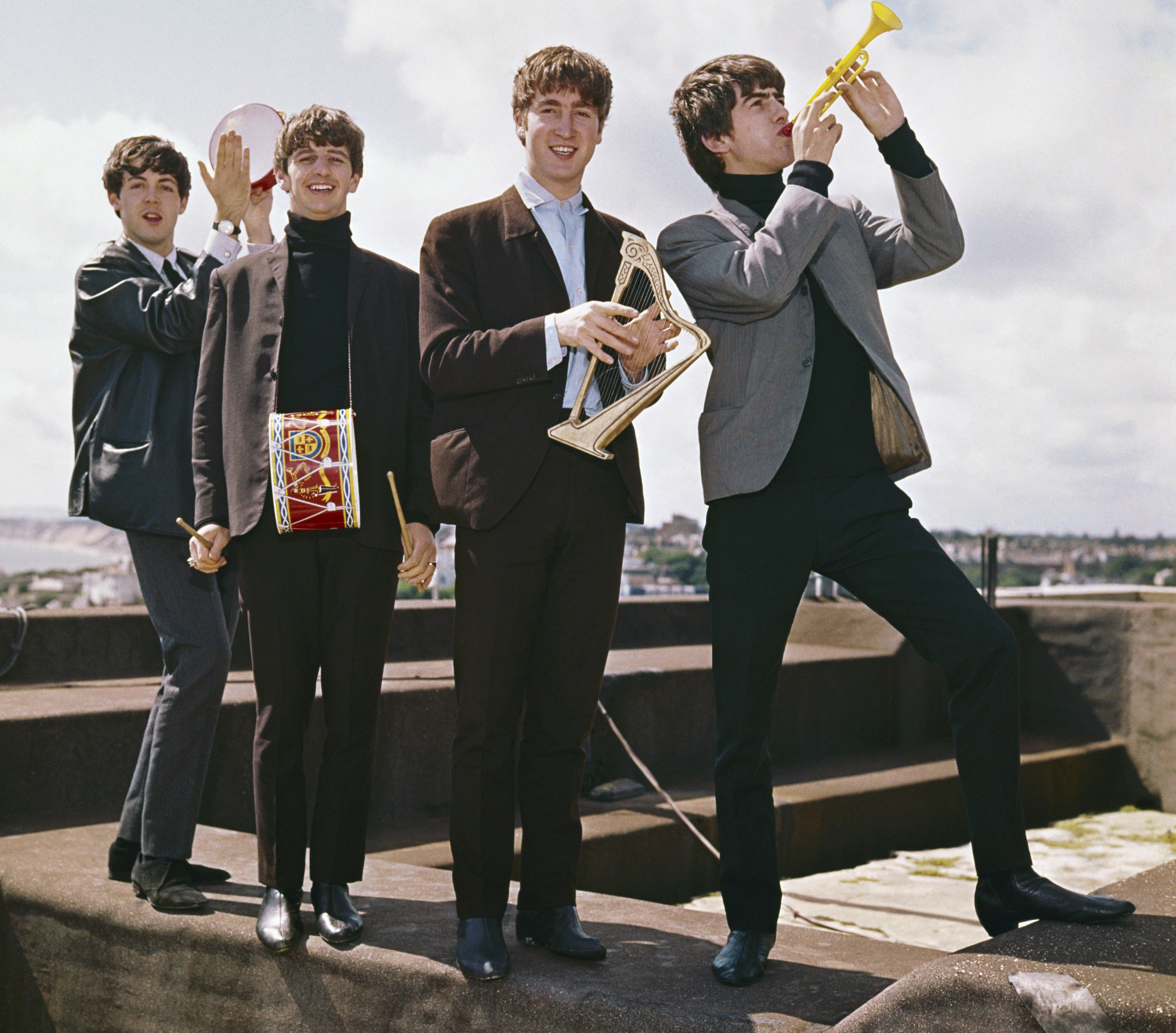 The Beatles’ Paul McCartney, Ringo Starr, John Lennon, and George Harrison on a roof