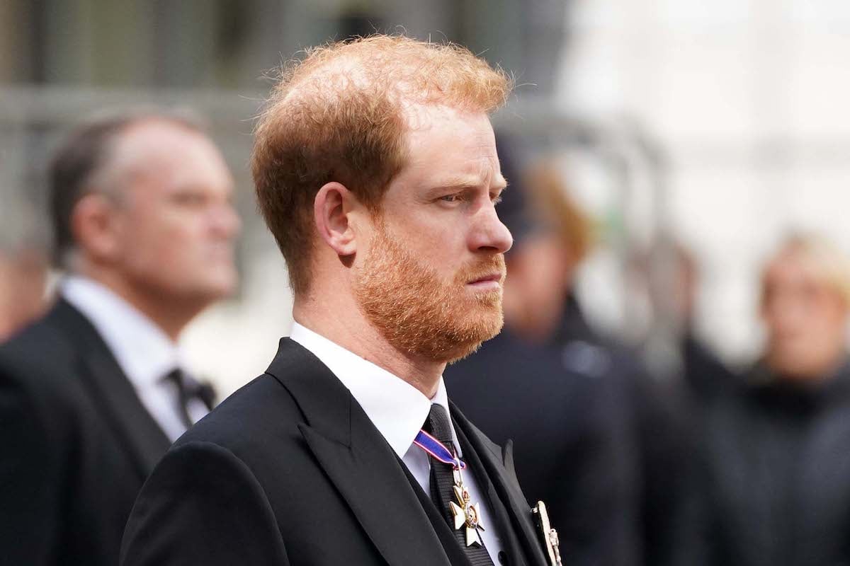 Prince Harry, who a body language expert says had a particularly difficult time during the moving of Queen Elizabeth's coffin, attends Queen Elizabeth's funeral on Sept. 19, 2022, at Westminster Abbey