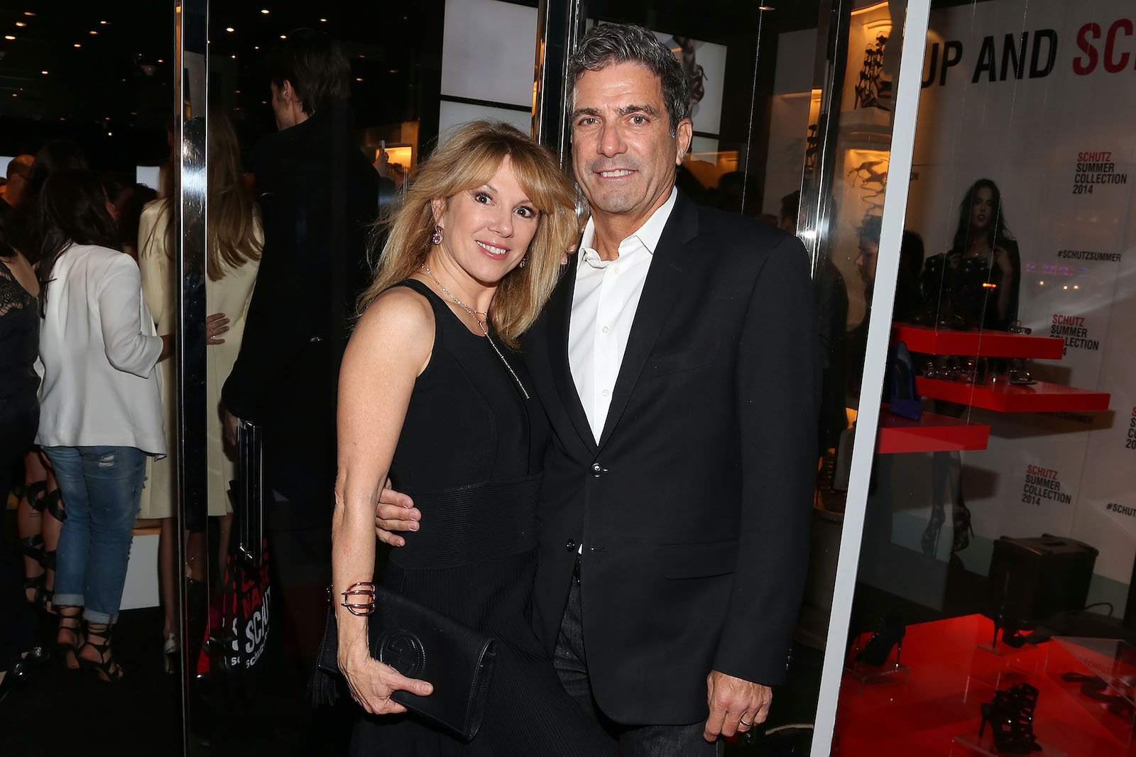 Ramona Singer from 'RHONY' stands next to Mario Singer and he has his arm around her waist