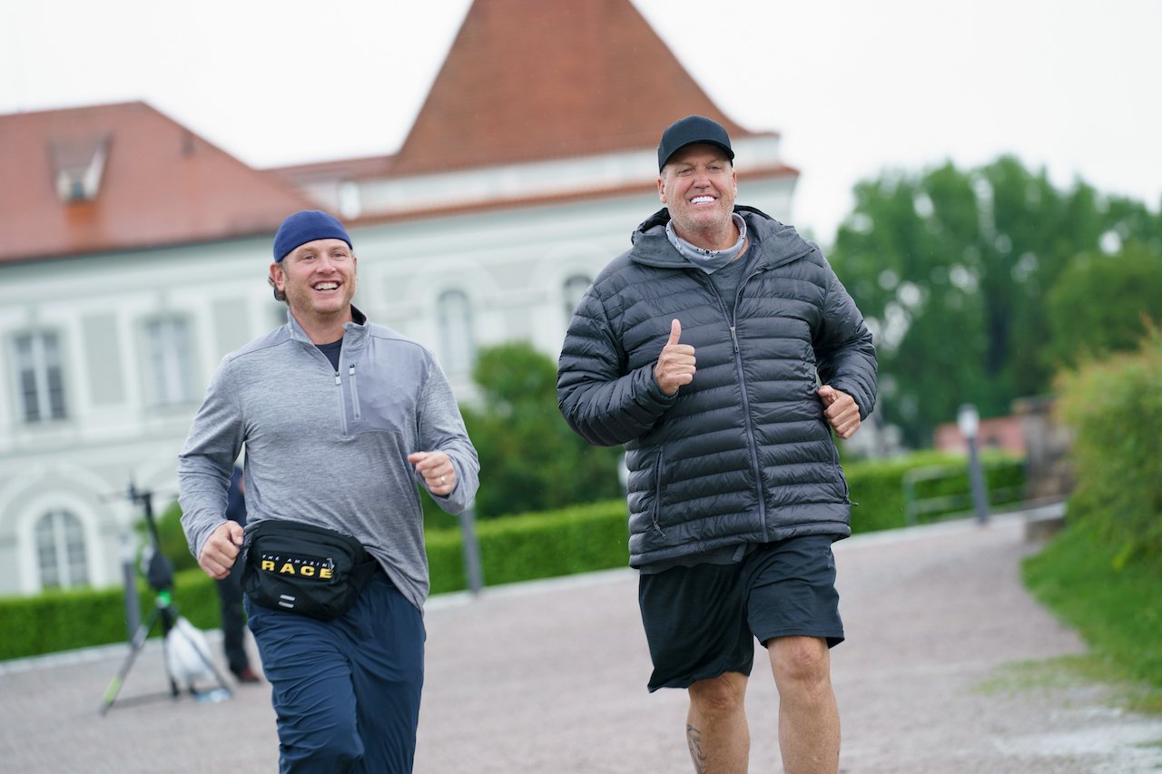 Rex Ryan and Tim Mann running next to each other on 'The Amazing Race 34'.