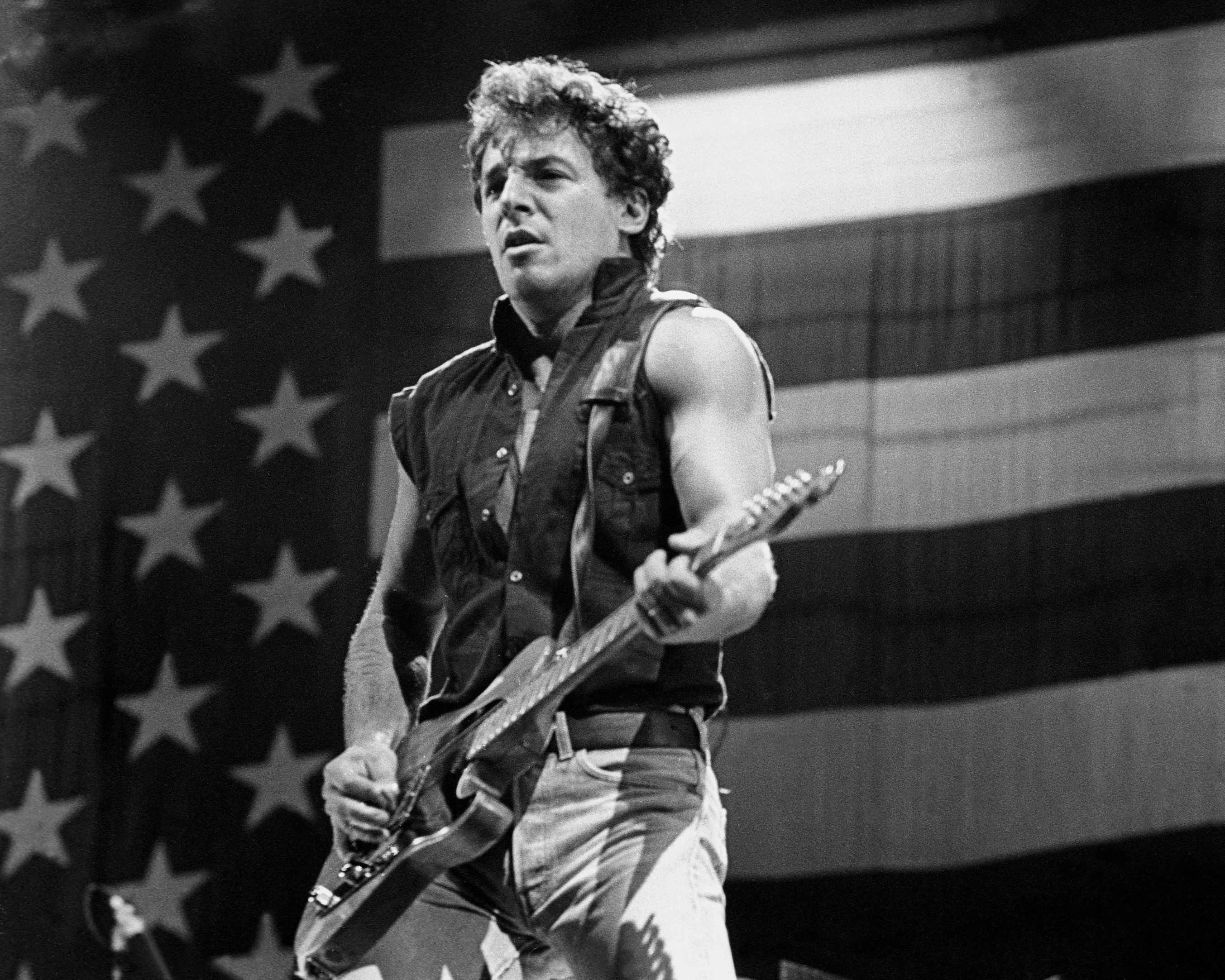 Bruce Springsteen performing with the E Street Band at the Oakland Stadium