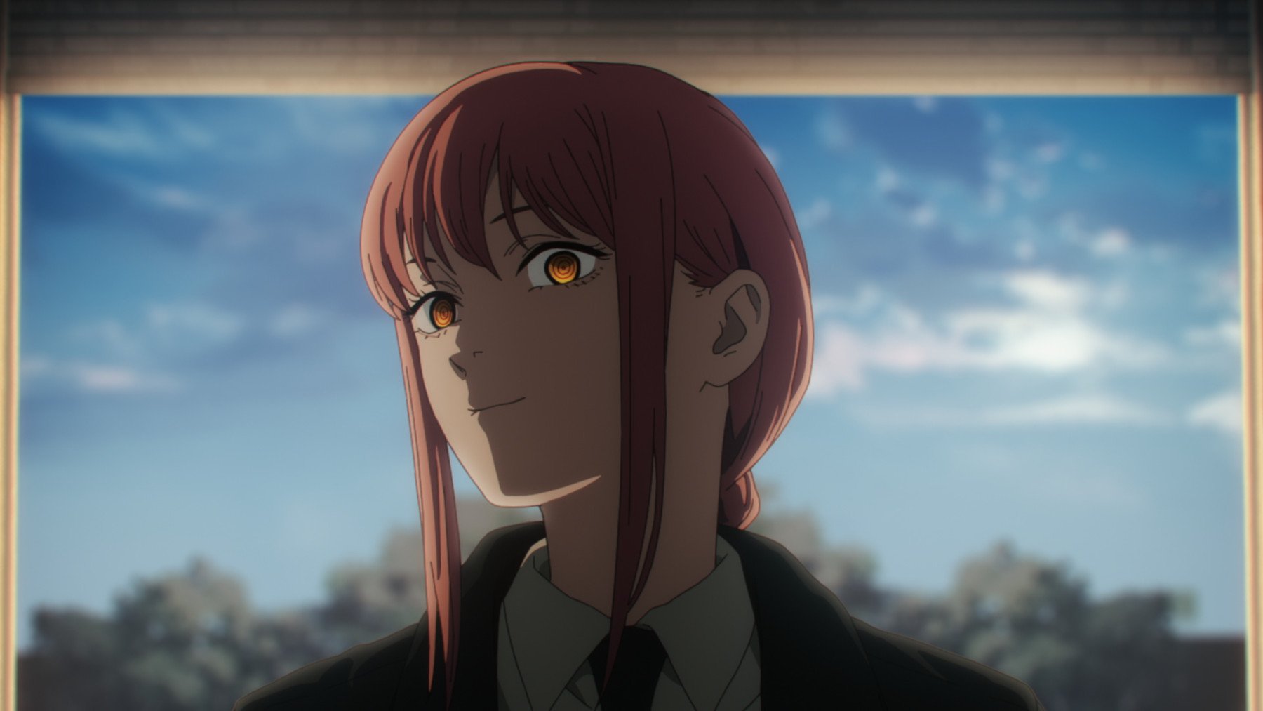 Makima in the 'Chainsaw Man' premiere. She has her pink hair pulled back into a ponytail and stands in front of a blue, cloudy sky.