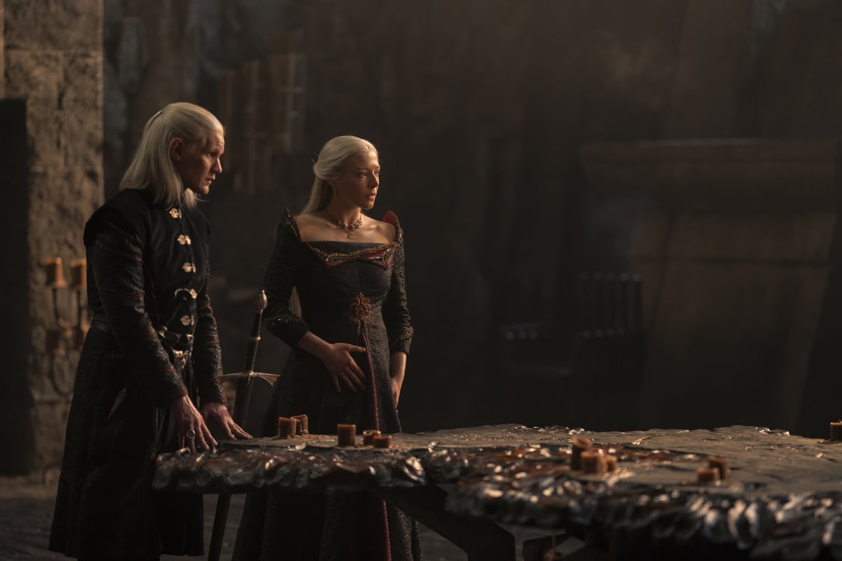 In House of the Dragon Daemon and Rhaenyra stand in front of a table-map of Westeros.